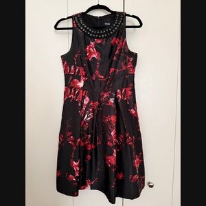 Sleeveless Black Dress with Red Floral Print and Beaded Neckline